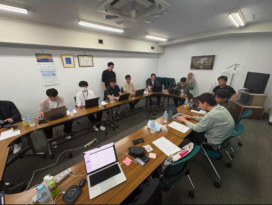 AI合宿の様子 - 参加者が作業中
